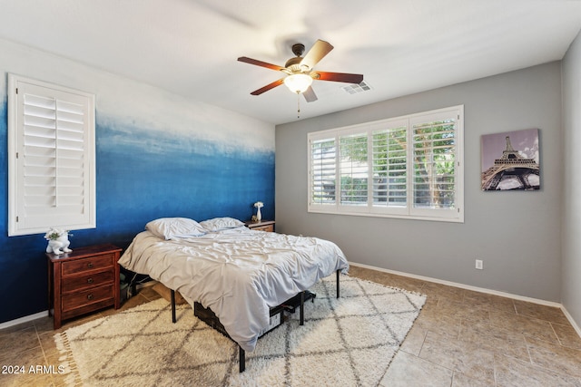 bedroom featuring ceiling fan