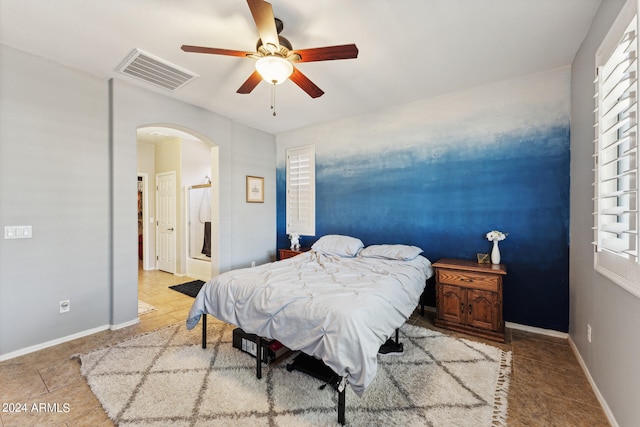 bedroom featuring ceiling fan