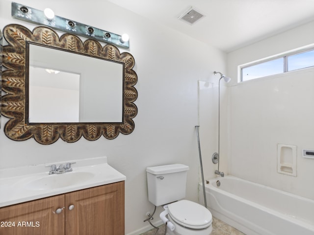 full bathroom featuring vanity, toilet, and washtub / shower combination