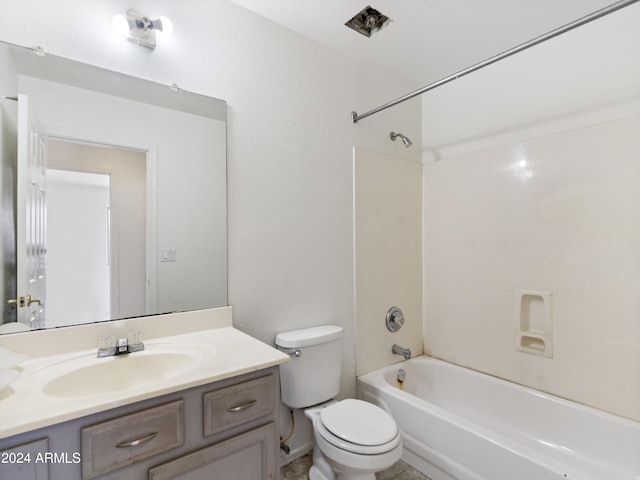 full bathroom featuring vanity, tub / shower combination, and toilet