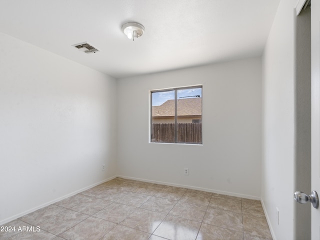 view of tiled empty room