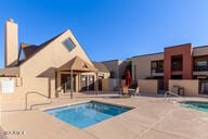 view of pool featuring a patio