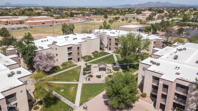 drone / aerial view with a residential view and a mountain view