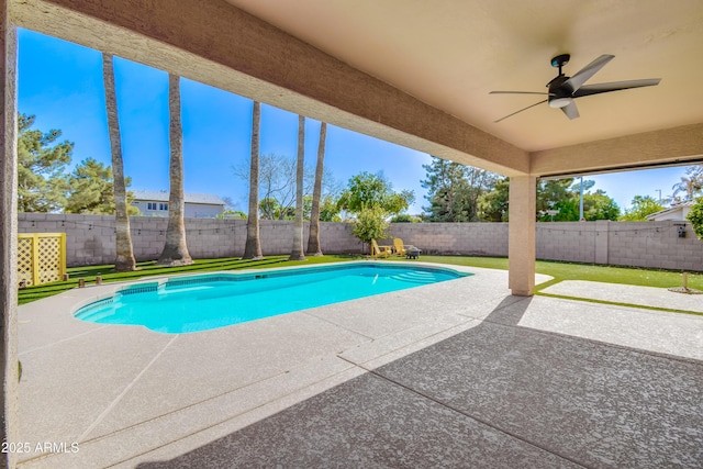 view of swimming pool with a ceiling fan, a fenced in pool, a fenced backyard, and a patio