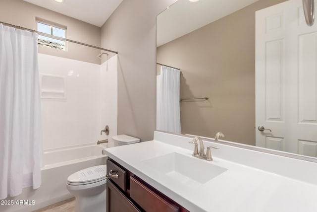 bathroom featuring toilet, shower / bath combination with curtain, and vanity