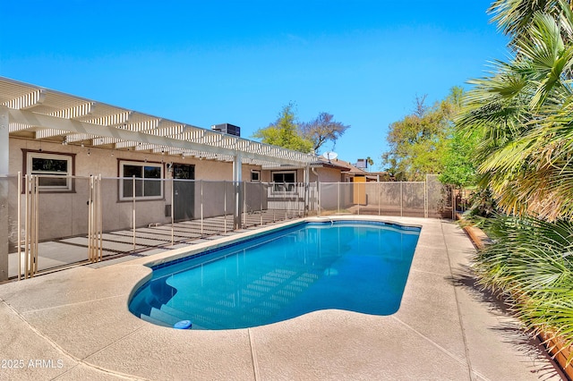 view of swimming pool featuring a patio, fence, a fenced in pool, and a pergola