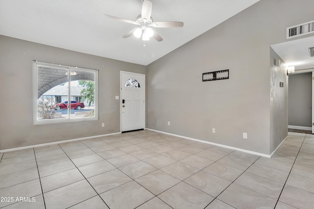 foyer with baseboards, visible vents, lofted ceiling, and a ceiling fan