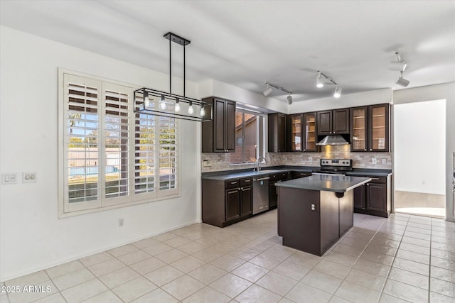 kitchen featuring light tile patterned flooring, dark brown cabinetry, a center island, pendant lighting, and stainless steel appliances