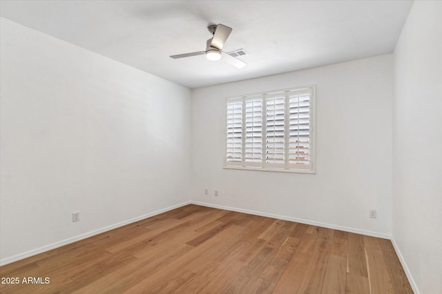 unfurnished room featuring ceiling fan and light hardwood / wood-style flooring