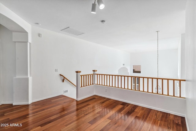 spare room featuring hardwood / wood-style floors