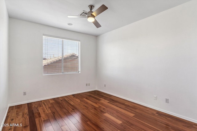 empty room featuring wood-type flooring and ceiling fan