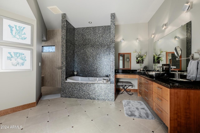 bathroom with shower with separate bathtub and vanity