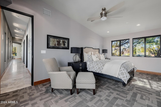 bedroom with ceiling fan and vaulted ceiling