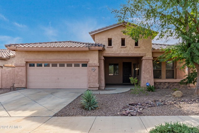 view of front of property featuring a garage