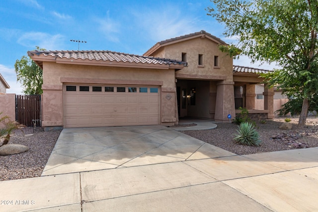 view of front of property with a garage