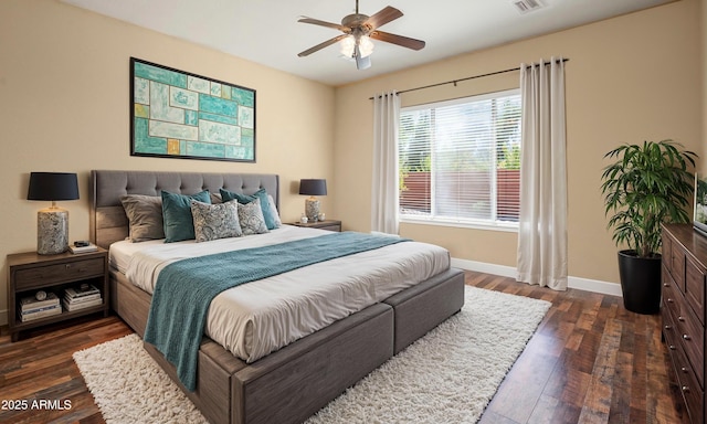 bedroom featuring dark hardwood / wood-style floors and ceiling fan