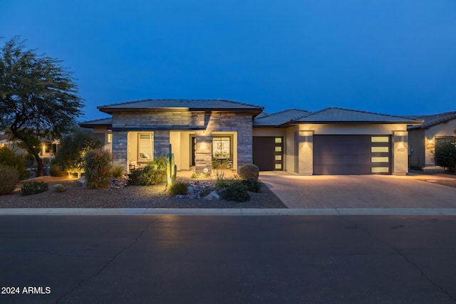 prairie-style house with a garage