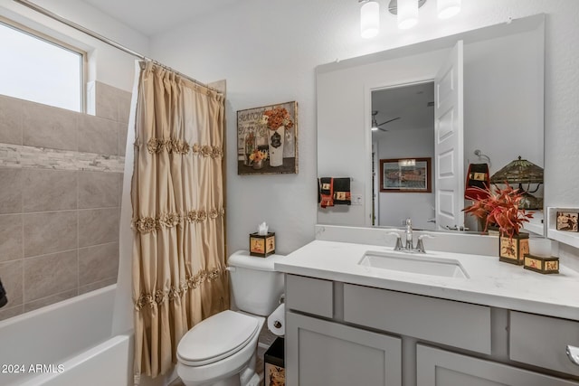 full bathroom with vanity, ceiling fan, shower / bathtub combination with curtain, and toilet