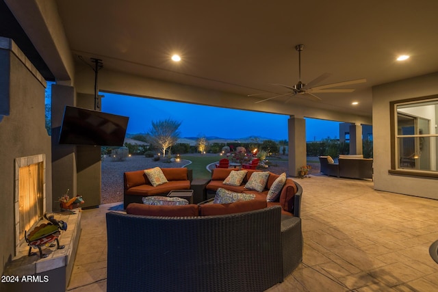 view of patio / terrace with ceiling fan and an outdoor hangout area