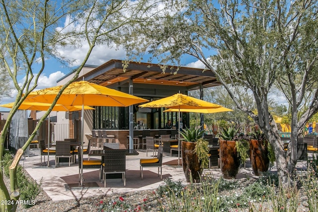 view of patio featuring a bar