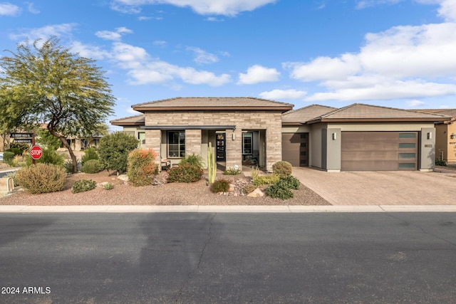 prairie-style house with a garage