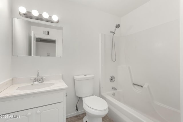 full bathroom featuring  shower combination, toilet, and vanity