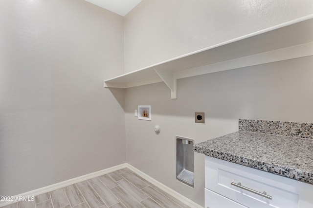 clothes washing area featuring hookup for an electric dryer, washer hookup, and hookup for a gas dryer