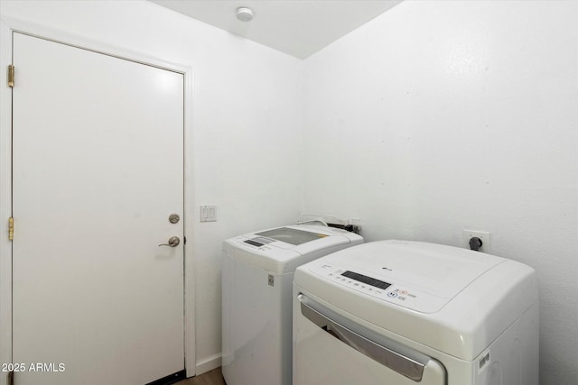 washroom featuring washer and dryer