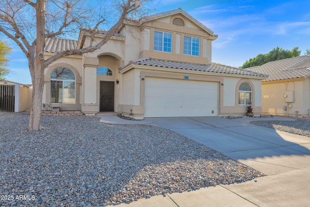 view of front of property featuring a garage