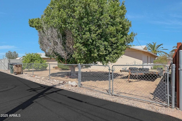 view of front facade with a gate and fence