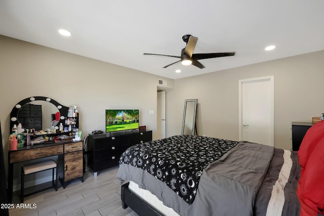 bedroom featuring recessed lighting, visible vents, a ceiling fan, and wood tiled floor