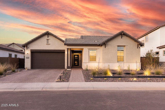 view of front of property featuring a garage