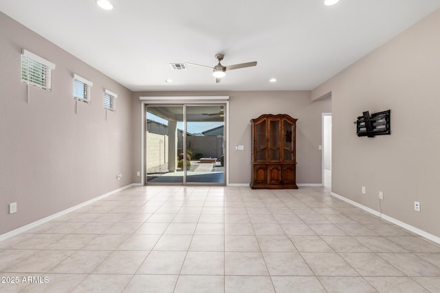 spare room featuring recessed lighting, baseboards, ceiling fan, and visible vents