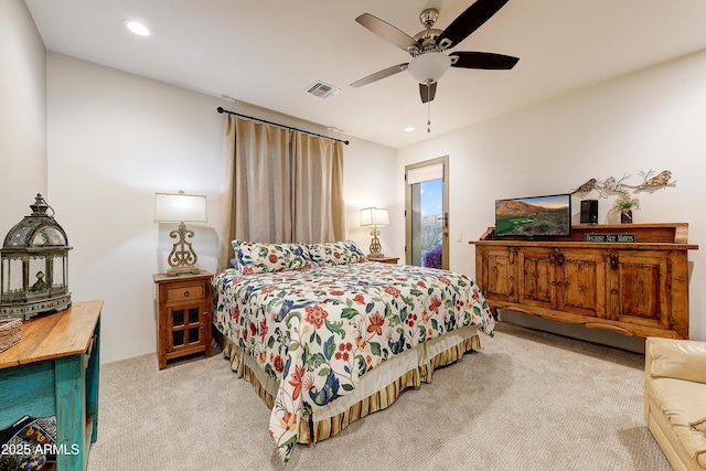 carpeted bedroom featuring ceiling fan