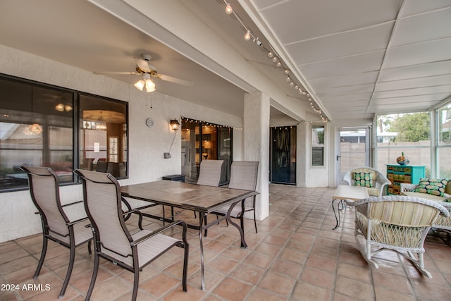 view of patio featuring ceiling fan