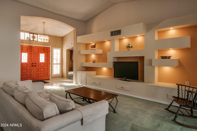 living room featuring high vaulted ceiling, a textured ceiling, carpet floors, and a notable chandelier