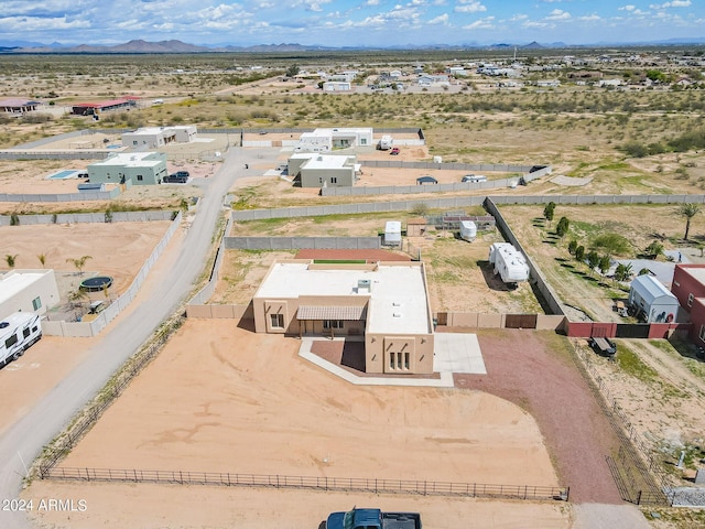 drone / aerial view featuring a mountain view