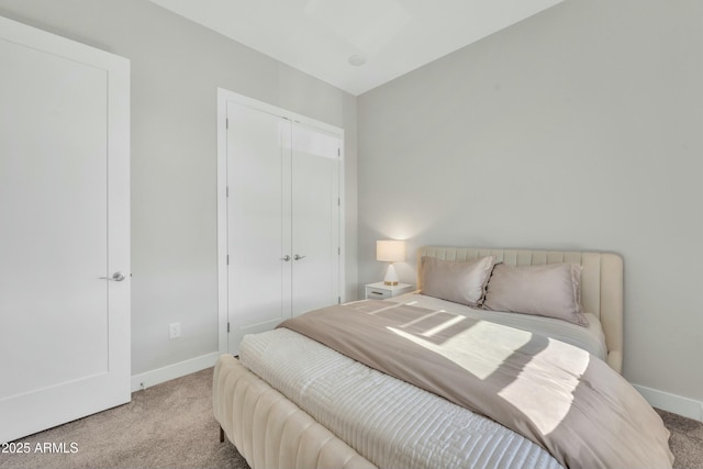 carpeted bedroom featuring a closet