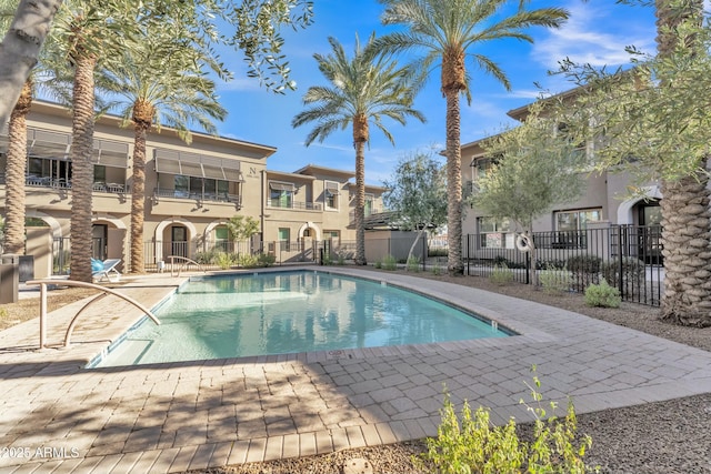 view of swimming pool featuring a patio