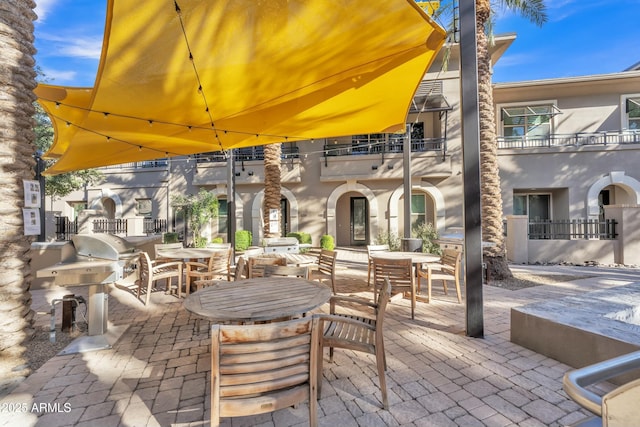 view of patio / terrace featuring exterior kitchen