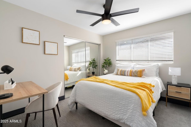 carpeted bedroom featuring a closet and a ceiling fan
