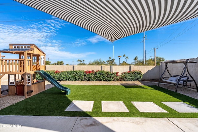 view of yard featuring a playground
