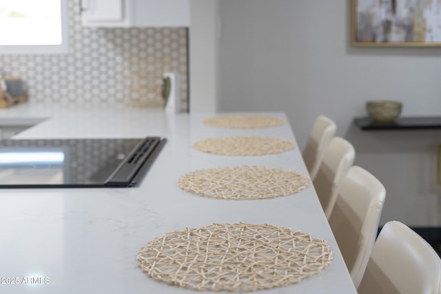 dining area view of tasteful backsplash