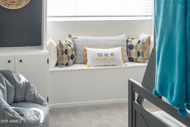 bedroom featuring carpet flooring and baseboards