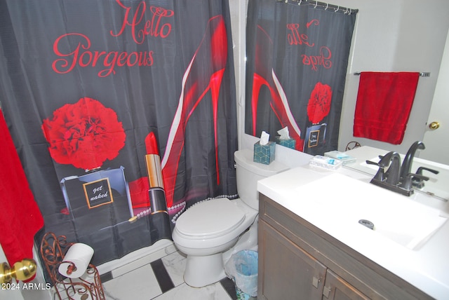 bathroom with vanity and toilet