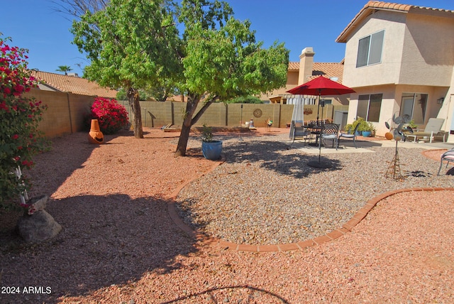 view of jungle gym with a patio