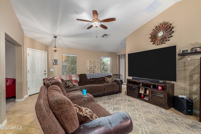 tiled living room featuring vaulted ceiling and ceiling fan