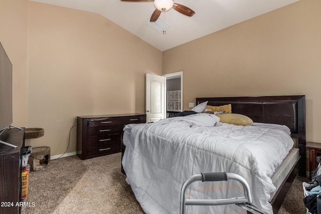 carpeted bedroom with vaulted ceiling and ceiling fan