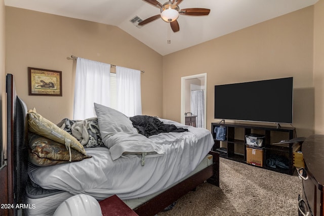 carpeted bedroom with lofted ceiling and ceiling fan