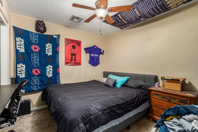 carpeted bedroom featuring ceiling fan